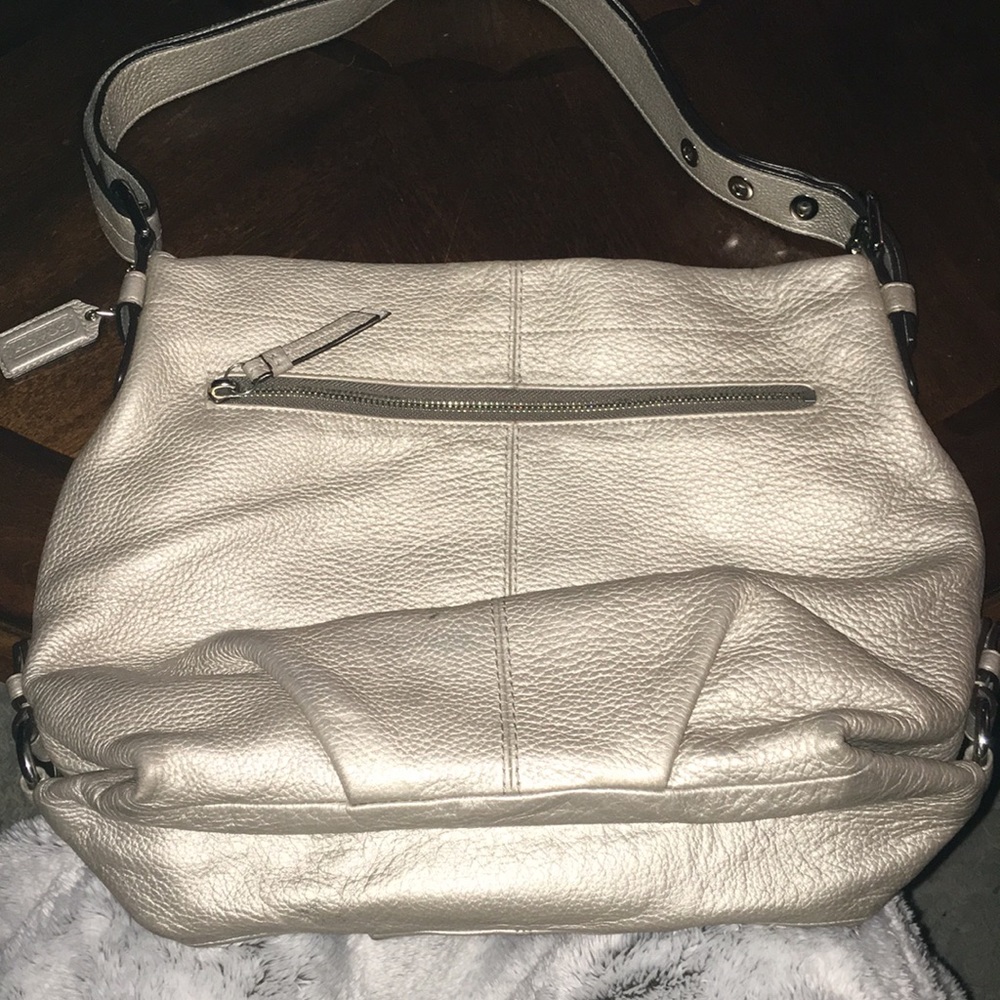 Coach leather purse.